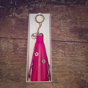Brand new Michael Kors leather charm.